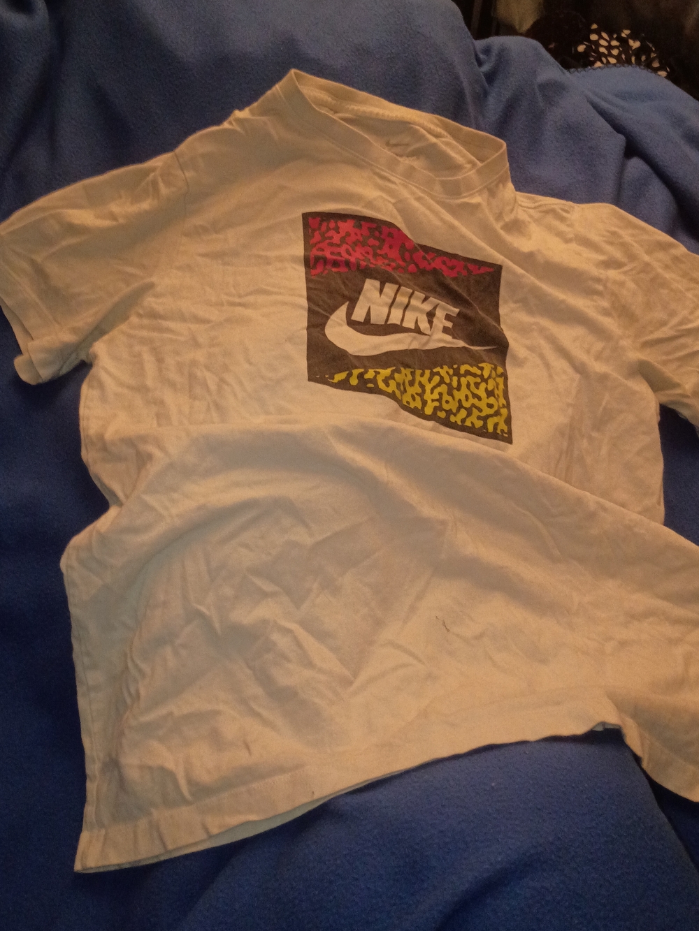 Nike Kids White Short-Sleeve Logo Tee with Pink and Yellow Accent